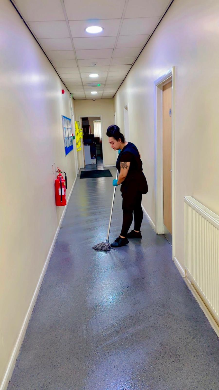 A Zeal FM operative maintaining communal areas at a customer site